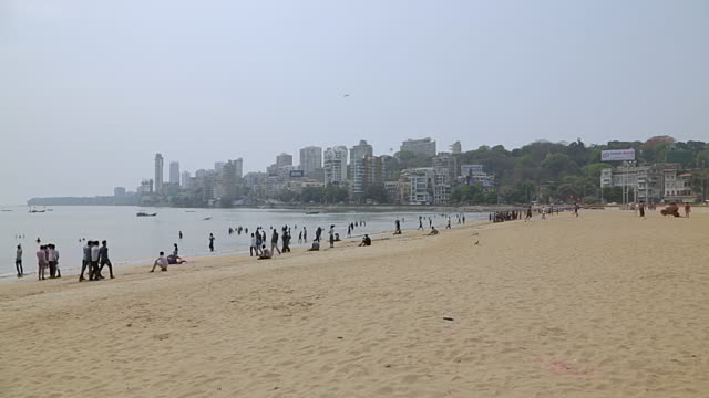 WS View of People at Chowpatty beach / Mumbai, Maharashtra, India